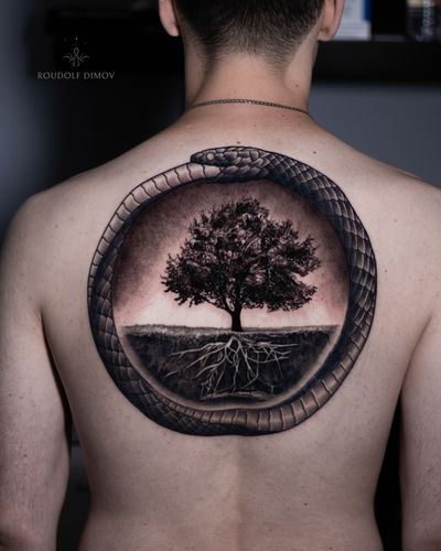 - Ouroboros - - Snake eating it self forming a circle with the tree of life in the middle , a tattoo that represents life and death • https://www.roudolfdimovart.com/