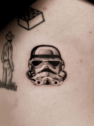 Check out this amazing Black and Gray tattoo of a Stormtrooper from Star Wars, done by the talented Caroline Feodorov!