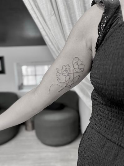 Experience the beauty of fine line tattoo art with this stunning and intricate singleline flower design by Aleks Fanta.