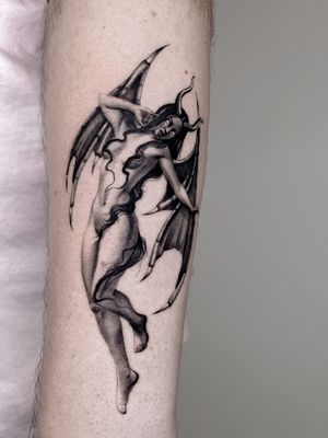 Get enchanted by Carolina Feodorov's mesmerizing black and gray micro realism tattoo featuring a devil and succubus duo.