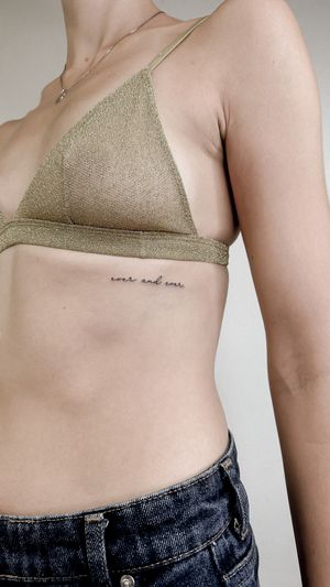 Get a delicate and meaningful tattoo with the quote 'Ever and Ever' by tattoo artist Carolina Feodorov. Perfect for those looking for a subtle yet striking piece.