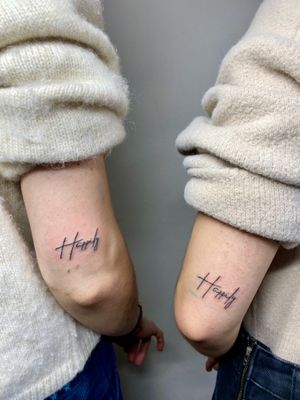 Get a delicate fine line and hand poked tattoo with small lettering by the talented artist Charlotte Pokes.