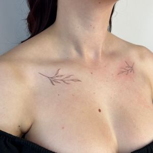 Unique dotwork tattoo by Alina Wiltshire featuring intricate branch and vine design done using hand-poke technique.