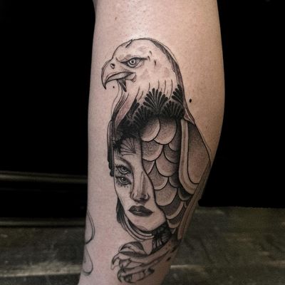 Bring a touch of elegance to your ink with this black and gray illustrative tattoo of an eagle and a lady. By artist Kiky Flore.