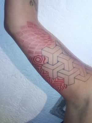 Geometric tattoo, blue and red