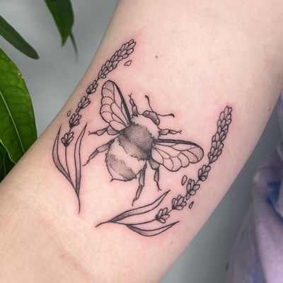 Capture the beauty of nature with a stunning bee design by Michelle Harrison. Precision and detail in every line.
