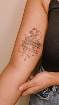 Bookish, celestial design, stack of book with little rose, butterfly and celestial ornaments