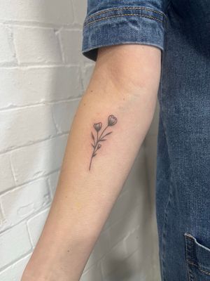 Unique dotwork design by Marketa.handpoke, featuring a stunning floral motif hand-poked with precision.