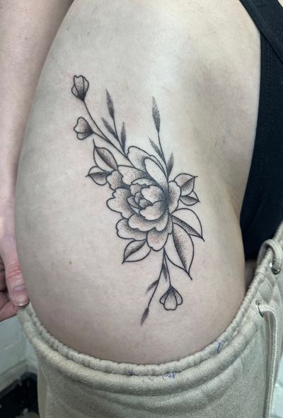 Discover the beauty of dotwork illustration in this stunning flower tattoo by Marketa.handpoke.