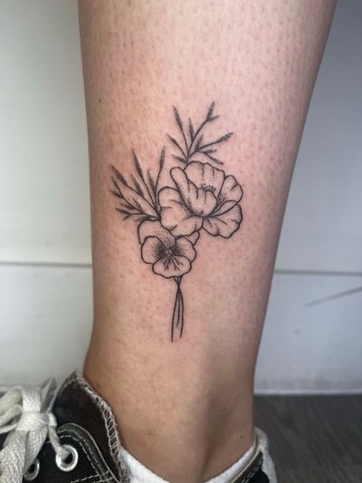 Exquisite hand-poked flower design by Marketa.handpoke, created using intricate dotwork technique for a unique and elegant look.