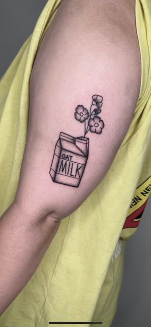 Unique dotwork hand_poke tattoo featuring a flower, milk box, and oat milk. Perfect for vegans. By Marketa.handpoke.