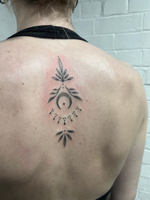 Experience the beauty of ornamental dotwork with this hand poked creation by Marketa.handpoke.