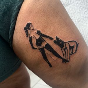 Experience the power of BDSM with this blackwork and traditional style tattoo by Miss Vampira. Submit to your dominant side.