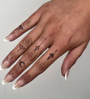 Unique hand-poked tattoo by Marketa.handpoke, featuring delicate dotwork and fine lines in an ornamental style.