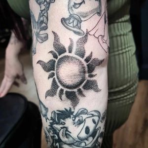 The sun design from Tangled, my customer sat like a champ for this elbow piece!