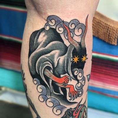Get a classic devil motif tattoo in traditional style by the talented artist Benji Charnock. Perfect for those who love bold and iconic ink.