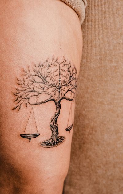 Explore the intricate beauty of dotwork and fine line techniques in this illustrative tree tattoo. Perfect for those seeking a delicate and symbolic design.