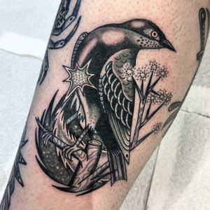 Get an illustrative traditional bird tattoo by the talented artist Benji Charnock. This timeless design will stand out and make a statement.
