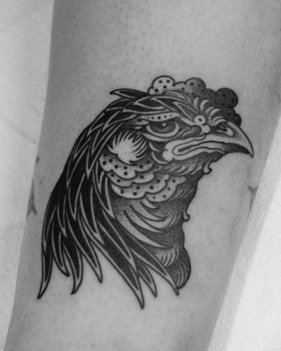 Get an illustrative tattoo of a majestic rooster in a medieval style by the talented artist Lukey Wolf. A unique and striking design!