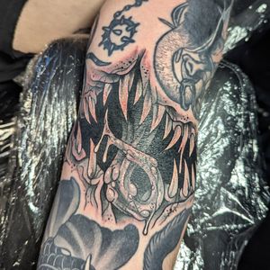Get scared with this haunting horror tattoo by Benji Charnock. Detailed and spooky, perfect for horror fans.