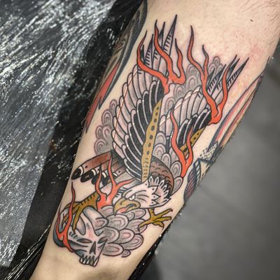 Get a bold and classic traditional eagle tattoo done by the talented artist Benji Charnock for a timeless and powerful look.