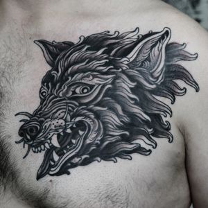 Capture the majesty of the medieval era with this illustrative wolf tattoo by Lukey Wolf. A timeless piece of art.