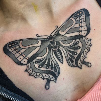 Traditional black and gray butterfly tattoo by Benji Charnock. Classic and timeless design.