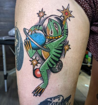 Hop into classic style with this traditional frog tattoo from talented artist Benji Charnock. Vibrant colors and bold lines make this design stand out.