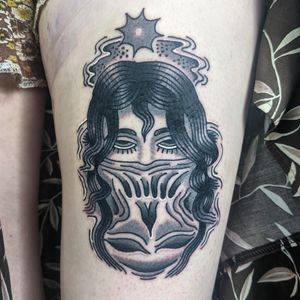 Capture the beauty of traditional art with this illustrative woman tattoo by talented artist Benji Charnock.