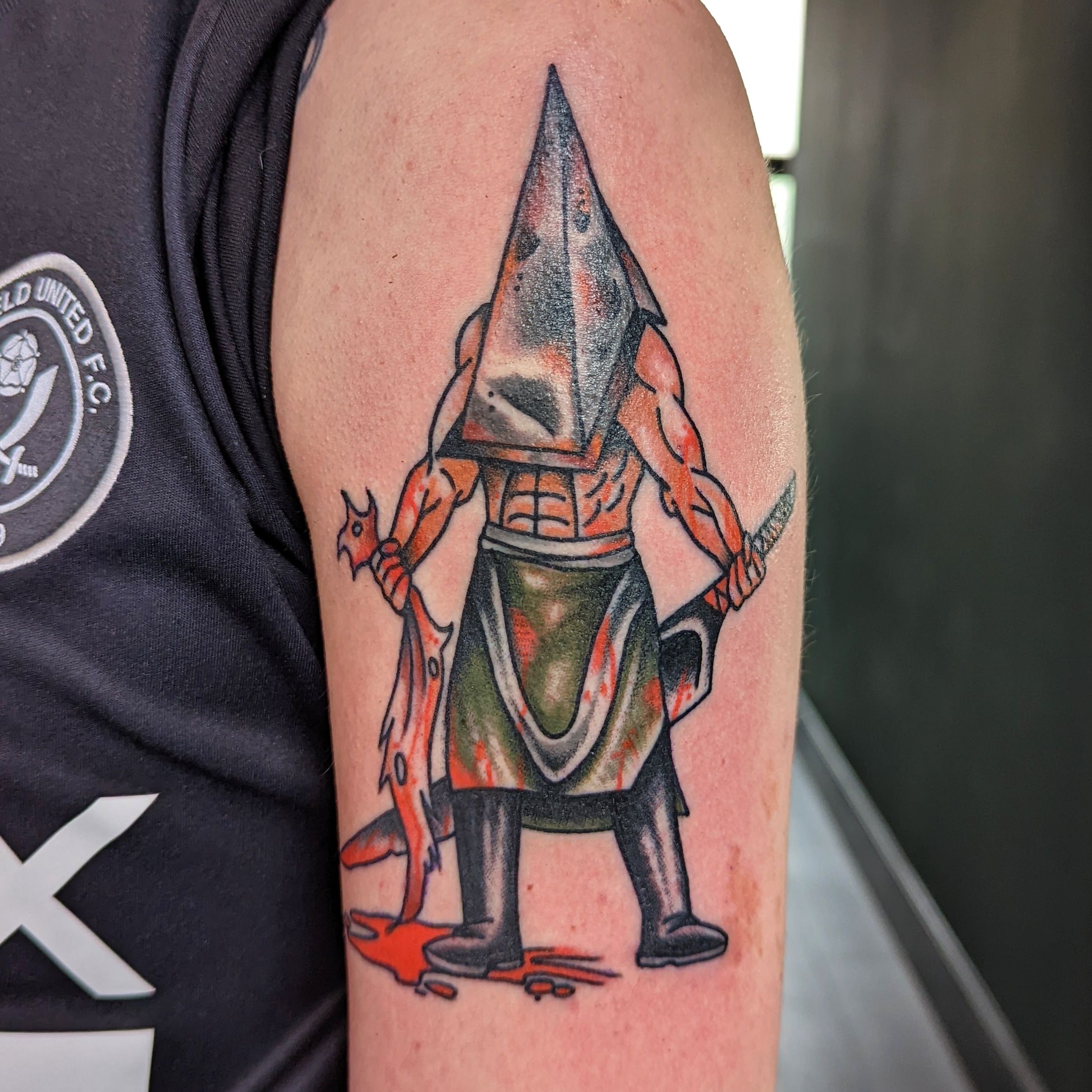 Pyramid head for @jacob.fln love doing gaming/anime colour tattoos 😍😍 # tattoo #ink #traditional #tattooartist #tattooart #tattooid... | Instagram