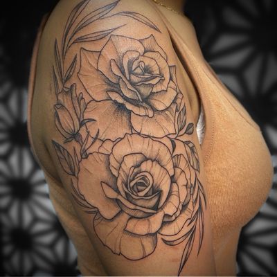 Black and grey floral piece with rose flowers