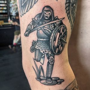 Embrace the valor of a knight with this classic traditional tattoo design by talented artist Benji Charnock. Perfect for those who seek courage and honor in their ink.