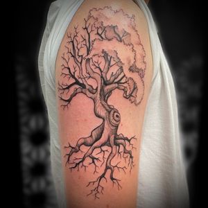 Get lost in the intricate details of this illustrative tree tattoo designed by the talented artist Marta Saviato.
