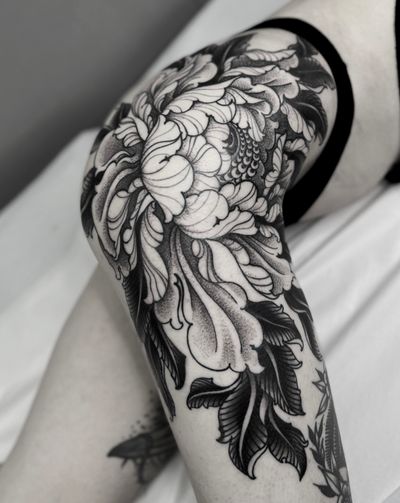 Get inked with a stunning peony flower tattoo by Lukey Wolf in illustrative style. Exquisite and timeless artwork.