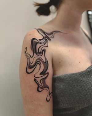 Abstract flow shoulder piece