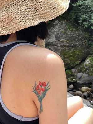 Floral tattoo healed ; Tulip