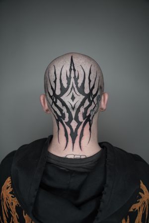 Get inked with a cutting-edge fusion of neo tribal and cyber sigil elements by Dominga Longo.