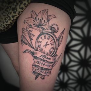 Lilies flowers clock an lettering tattoo