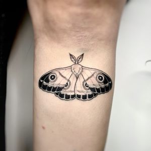 Adorn your skin with a stunning illustrative moth tattoo created by the talented artist Michelle Harrison. Embrace the beauty of nature on your body.
