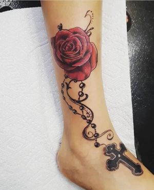 Beautiful faithful rosary tattoo 