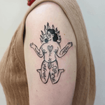 Experience bold and striking artwork with this ignorant woman tattoo designed by renowned artist Adam McDade. Embrace your individuality with this unique piece of body art.
