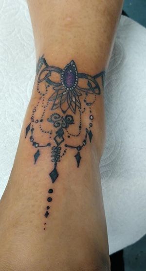 Intricate jewelry tattoo 