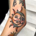 Get a stunning traditional tattoo of sun and moon by Clara Colibri, blending mystical elements in perfect harmony.