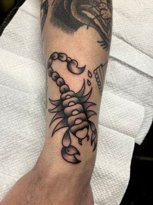 Get fierce with this traditional style scorpion tattoo by Clara Colibri, showcasing intricate details and bold lines.
