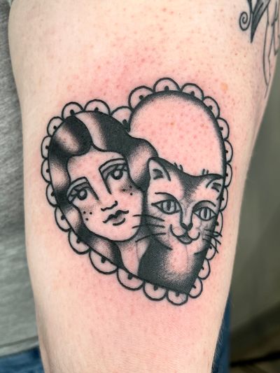 Admire the exquisite detail of Clara Colibri's framed woman and cat portrait, brought to life in traditional tattoo style.