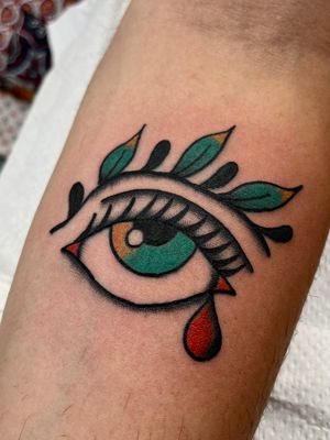 Get a mesmerizing illustrative eye tattoo by Clara Colibri, blending tradition with modern artistry. Stand out with this unique piece of body art!