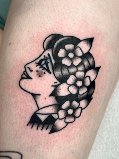 A stunning traditional tattoo of a lady by the talented artist Clara Colibri. Classic style with a modern twist.
