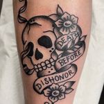 Skull with 'Death Before Dishonor' banner by Clara Colibri. Classic traditional style.