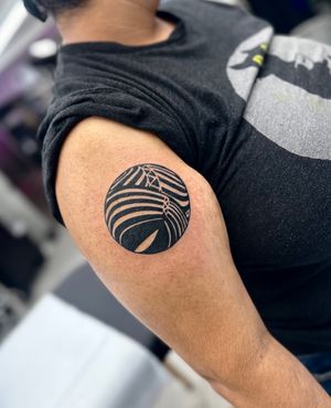 Explore the depths of art with this mesmerizing abstract sphere tattoo by the talented artist Miss Vampira. A unique blend of intricacy and simplicity.