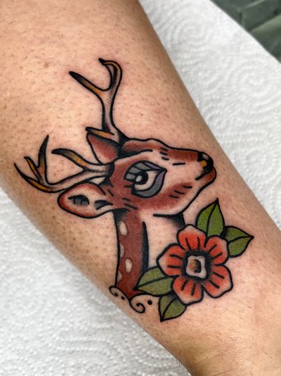 Capture the beauty of nature with this traditional deer tattoo by renowned artist Clara Colibri.